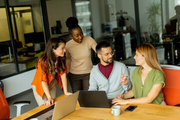 Young multiethnic startup team working in the modern office