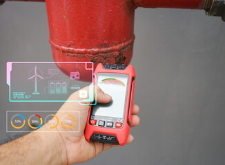 hand holding a measuring instrument