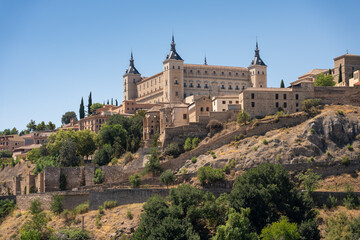 Fototapeta na wymiar Alcázar of Toledo on top of a hill, former fortification and currently an army museum. Toledo. Spain. July 29, 2023.