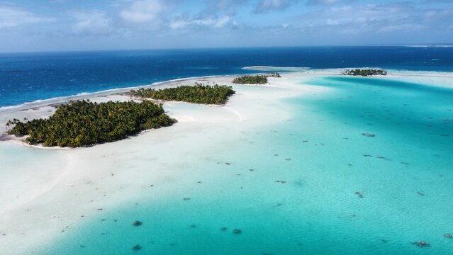 Aerial view of the stunning blue lagoon at Rangiroa Atoll; French Polynesia