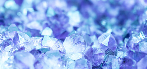 Blue Crystal Mineral Stone. Gems. Mineral crystals in the natural environment. Texture of precious and semiprecious stones. Seamless background with copy space colored shiny surface of precious stones