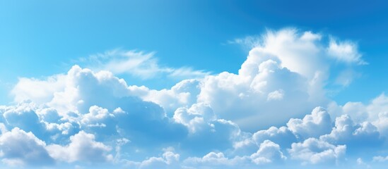 Naklejka na ściany i meble Background with blue sky and clouds