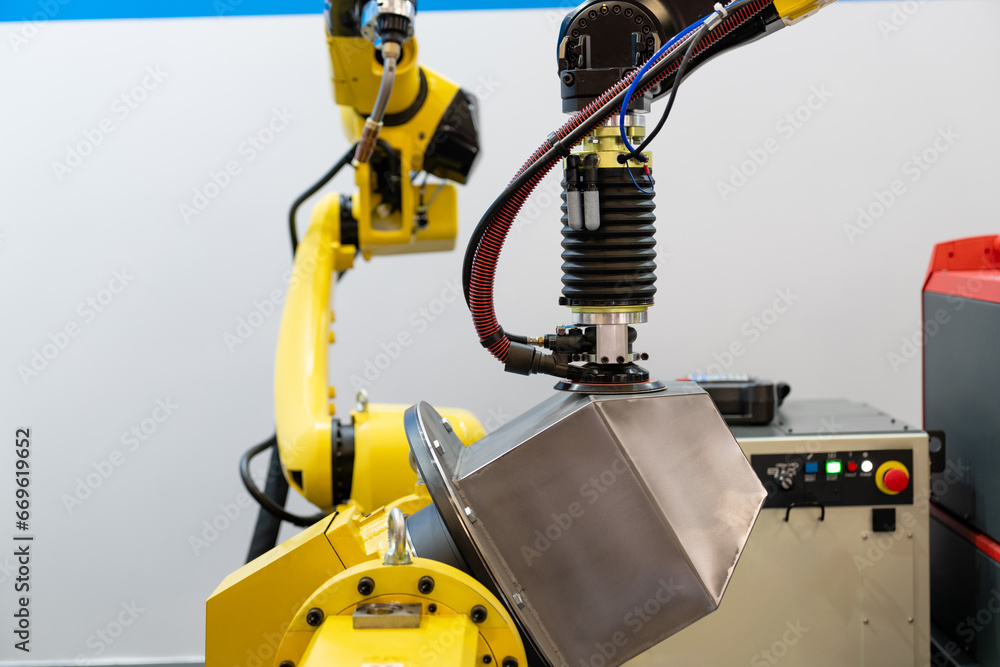 Poster Automatic welding robot in a modern factory in operation