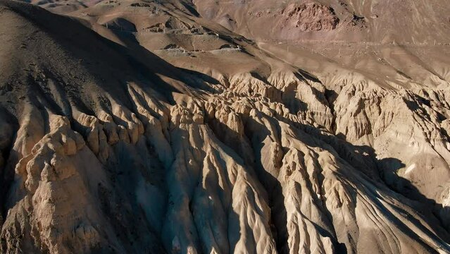 Landscape in Lamayuru, Ladakh - known as the &lsquo;Moonland&rsquo;, due to its unique terrain that resembles the surface of the moon. Barren mountains, rocky outcrops, create a stark and otherworldly atmosphere.