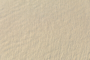 Obraz premium pattern of sand at the beach in harmonic structure