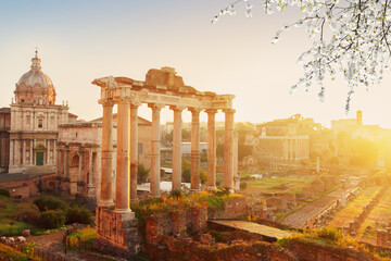 Forum - Roman ruins with cityscape of Rome with sunrise light at spring day, Italy