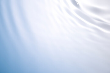 The clear blue surface of the water gradients from light to dark.