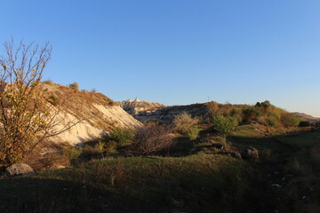 A landscape with hills and trees