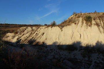 A hill with dirt and grass