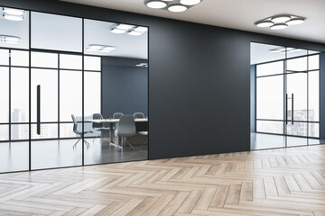 Modern gallery interior with blank mock up place on black wall , windows with city view, reflections on wooden parquet flooring and daylight. 3D Rendering.