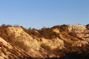 A hill with a hill and trees