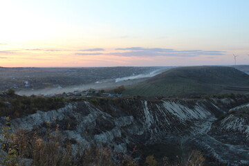 A landscape with a river and mountains