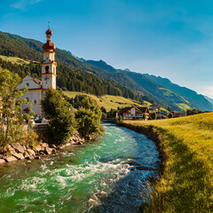 Alpine summer view with a church and the river Ahr at St Johann, San Giovanni, Ahrntal valley,...