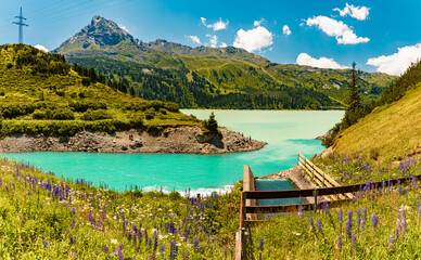 High resolution stitched alpine summer panorama at Kops reservoir, Sylvretta-High-Alps-Street,...