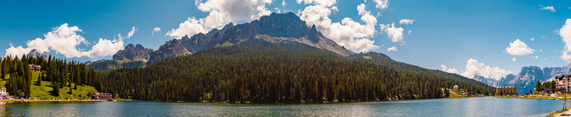 High resolution stitched alpine summer panorama with reflections at Lago di Misurina, Lake...