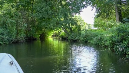 a relaxed trip along a private tree-lined waterway