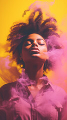 Beautiful afro american woman standing in front of a pink smoke on yellow background