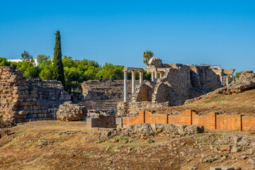 View of the ruins of the architectural complex of the Amphitheater and Roman Theater of M&eacute;rida and the stage with its spotlights and scaffolding of the Roman theater with columns.