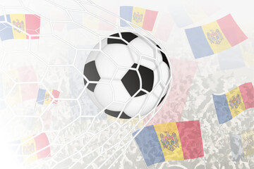 National Football team of Moldova scored goal. Ball in goal net, while football supporters are waving the Moldova flag in the background.
