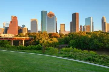 Deurstickers Houston downtown skyscrapers during sunset. Buffalo Bayou Park. Texas, USA © vivoo