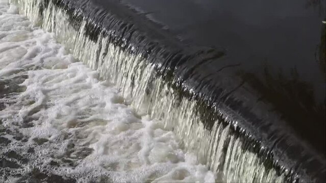 Odense, Denmark Fast running water and rapids on the  Odense River in downtown. 