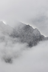 morning fog in the julian alps, italy