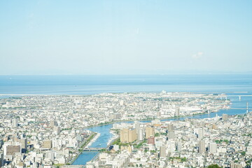Fototapeta premium City view of Tokushima from Mt. Bizan in Tokushima, Japan - 日本 徳島 眉山からの街並み