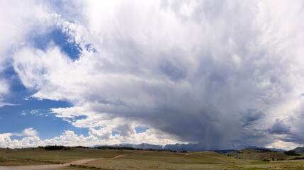 heavy grey clouds above Altai mountains
