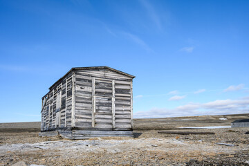 Rustic wooden cabin at research station at Kinnvika, historic artifacts, Murchison Fjord, Hinlopen...