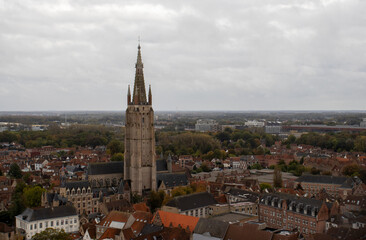 Fototapeta na wymiar Panoramic Aerial View of Bruges with Historic Church of Our Lady and Picturesque Rooftops