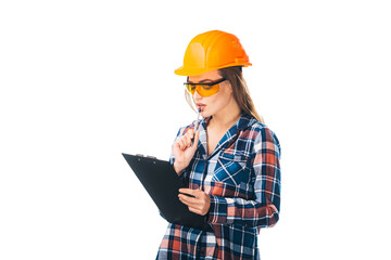 A Professional Woman Inspecting Construction Site with Confidence. A woman wearing a hard hat and holding a clipboard