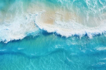 Foto op Canvas Top view of ocean waves near a tropical island, displaying stunning blue hue. Generative AI © Cassidy