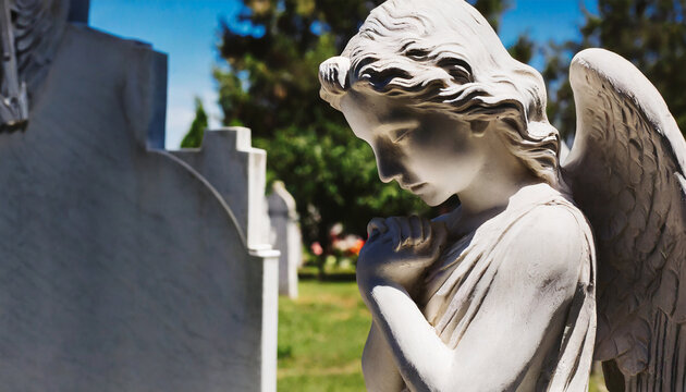 image with background and place for caption and fragment of tragic sad angel statue at the cemetery funeral ceremony