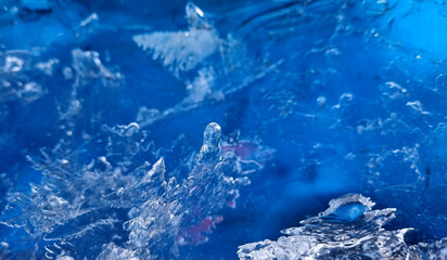 Ice structure. Blue cold is a better mood for the background. Selective focus