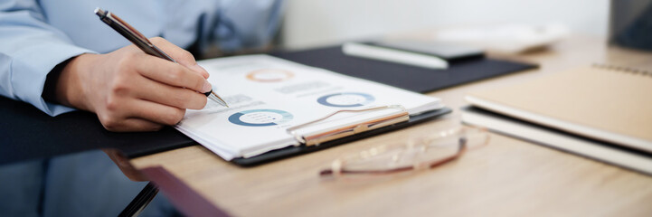 Woman Analysis Business Accounting working with Individual income tax return Accounting concept..