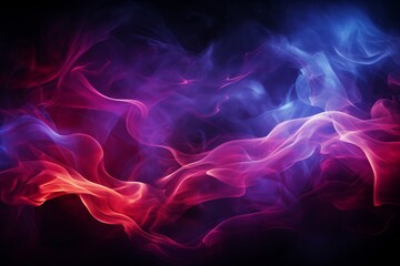 Colorful pink, orange, blue and purple smoke on a black isolated background.