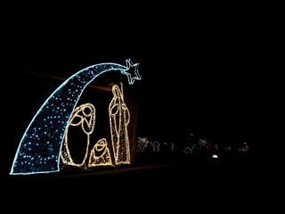 Representation of the nativity scene through led lights. Christmas decoration in the city.