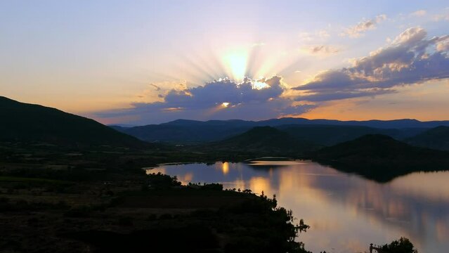 Aerial shot of a mountain lake at sunset