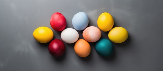 Fototapeta na wymiar Easter eggs on a gray backdrop