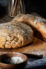 Fresh homemade bread on a wooden cutting board