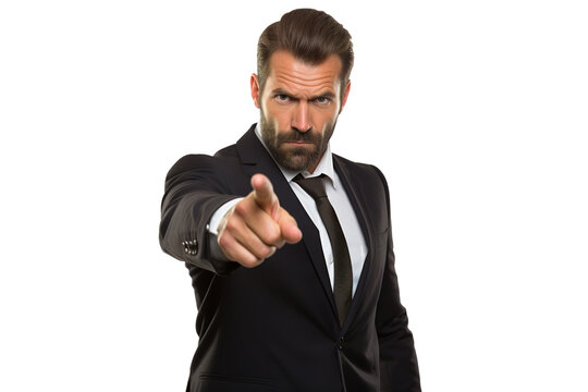 Angry businessman or boss blaming and pointing finger toward camera in black suit and tie isolated on white background.