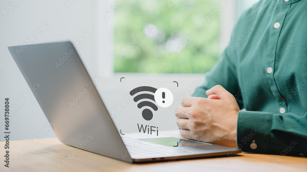 Poster User using a laptop computer to connect to wifi but wifi not working or password is incorrect and waiting to loading digital data form website.Technology concept of wifi connected but no internet.
