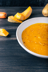 Pumpkin and carrot cream soup. Autumn dish suitable for lunch and dinner.