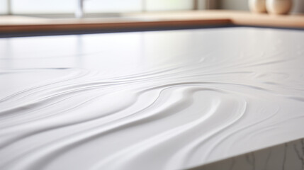 A white, textured countertop, with a subtle pattern of lines and circles  - obrazy, fototapety, plakaty