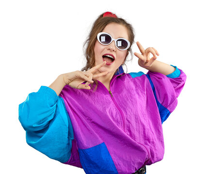 Cool teenager. Fashionable DJ girl in colorful trendy jacket and vintage retro sunglasses enjoys style of 80s-90s vibes. Teenager at disco party. Young fashion model isolated. PNG.