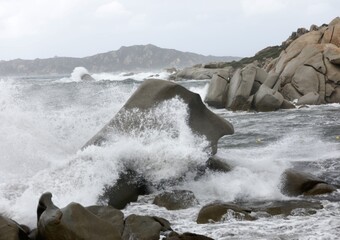 waves crashing on rocks