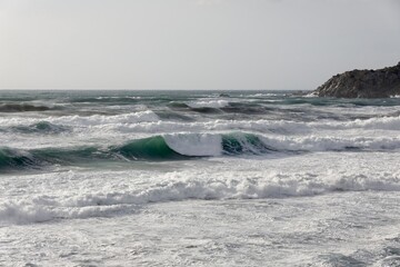 waves crashing on rocks