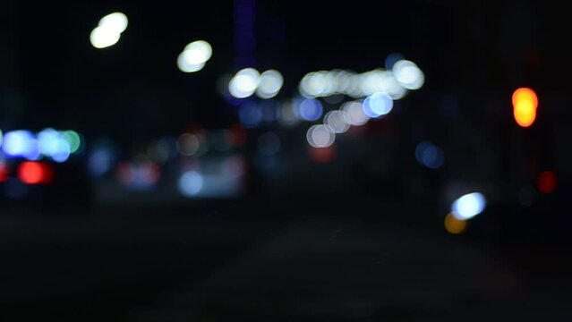 Blurred view of night city street 