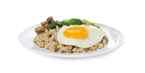 Tasty boiled oatmeal with fried egg, avocado and mushrooms isolated on white