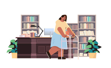 disabled woman librarian standing with walking stick in bookstore or library people with disabilities concept horizontal